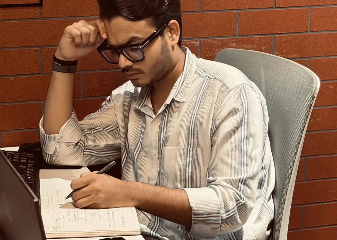 Taking notes at a desk